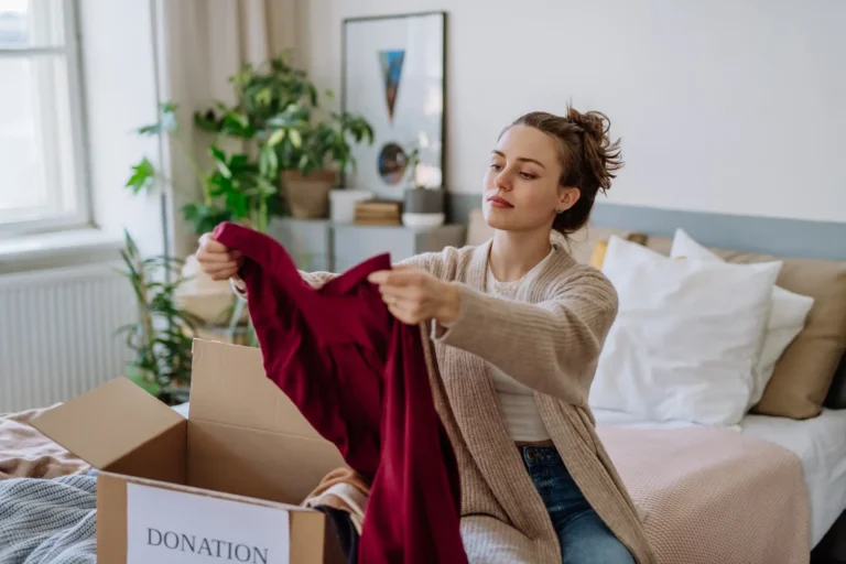 woman decluttering clothes